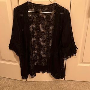 Light cover for dress or camisole.